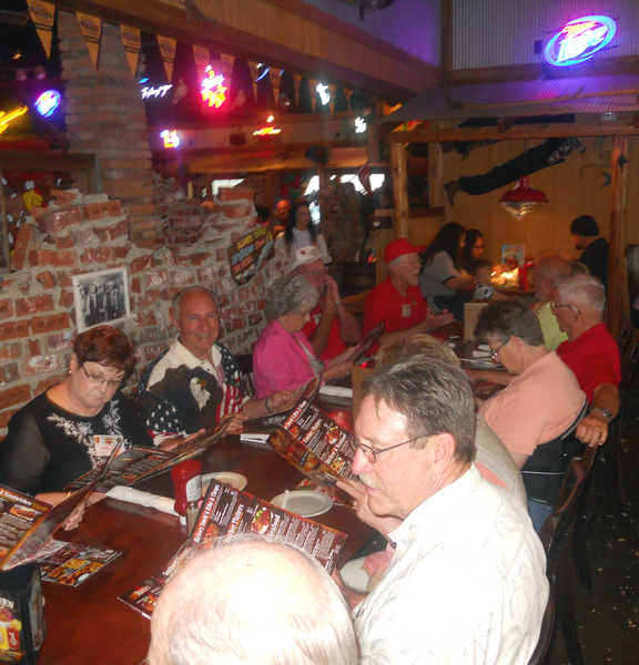 Reunion Photos - Jerry Orr
Off-post chow was part of the program of the historic reunion.  David Scott looks up from his menu.
