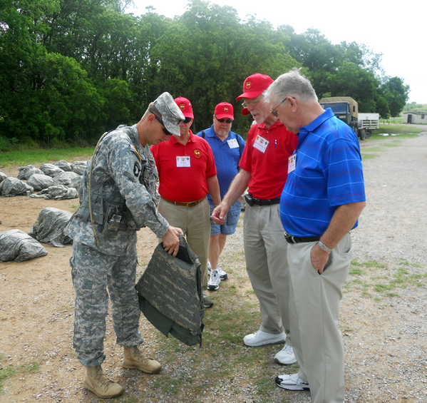 Reunion Photos - Jerry Orr
What's inside these new flak vests?  Joe Cook, Mike Huseth, Moon Mullins and John Cashin await the answer.
