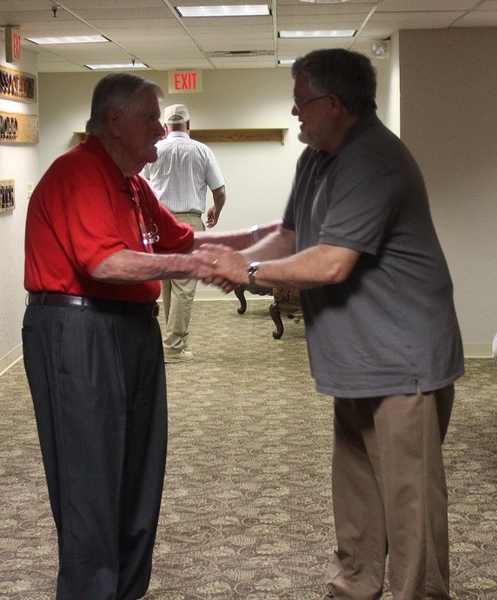 The Waldman Collection - Presenting Gifts
Host Jerry Orr presents "challenge coins" to those attending this historic reunion.
