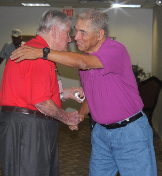 The Waldman Collection - Presenting Gifts
Host Jerry Orr presents a "challenge coin" to Sam Nieto.
