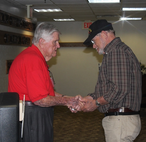 The Waldman Collection - Presenting Gifts
Host Jerry Orr presents a "challenge coin" to Raymond Hobbs, RTO for Dennis Munden, FO.
