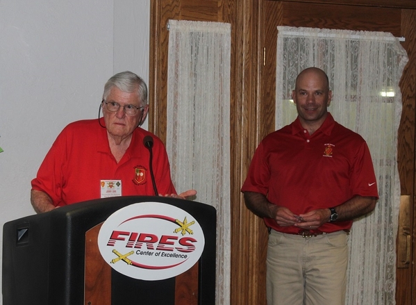 The Waldman Collection - Presenting Gifts
Host Jerry Orr presents "challenge coins" to those attending this historic reunion.  Jerry honors our Ft Sill host, LtCol Jones. LtCol Jones was responsible for the guided tour of the current artillery basic training site visits.
