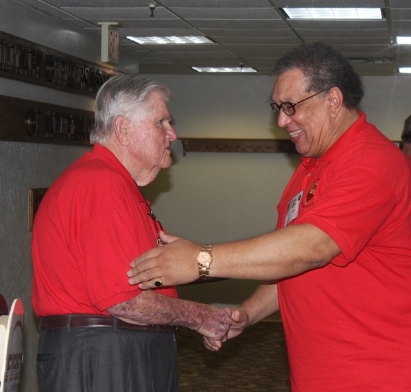 The Waldman Collection - Presenting Gifts
Host Jerry Orr presents "challenge coins" to Lee Dixon.  Lee served in the Bn Commo Section and had an "alter ego" as the Battalion "gopher", making several trips to Saigon to search out goodies.
