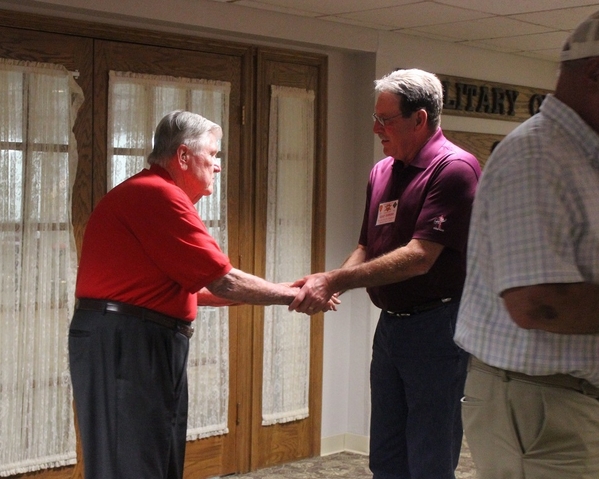 The Waldman Collection - Presenting Gifts
Host Jerry Orr presents "challenge coins" to those attending this historic reunion.
