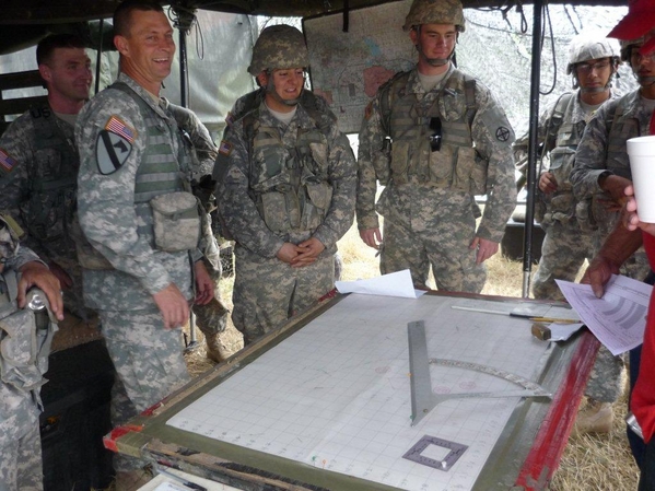 Reunion Photos - Dave Price
Today's FDC?  Not quite!  All the computer laptops were behind these men out of sight.  The old firing chart with RDP and square are on display...probably just for our benefit to remind us of our time in service...ie, the "old days".  And, yes...the "check chart" has been abolished.
