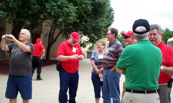 Reunion Photos - Stu Royle
Havin' a ball!  We seem be enjoying our tour stop at the basic training buildings.  Terry Stuber is adjusting his camera.
