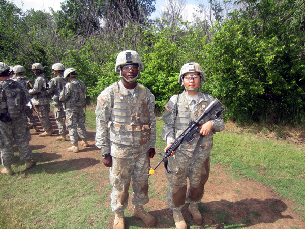 Reunion Photos - Wayne Crochet
Here are a couple of artillery recruits who are foreign nationals, one from Africa and one from Korea.  They will get their US citizenship commensurate with their graduation from basic training.  Photo taken as the recruits were undergoing field training.
