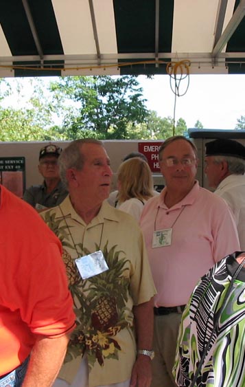 Good Buddies
Capt Dave Collins, C-1-35 with his former FO, Lt Bert Landau.  They found the shade of a tent while waiting for the photo session.
