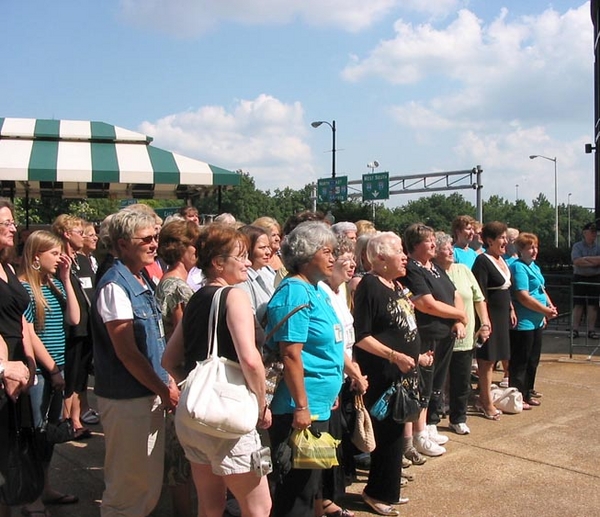 Ladies' Turn
The ladies wait patiently in the hot July sun for their photo at the reunion.
