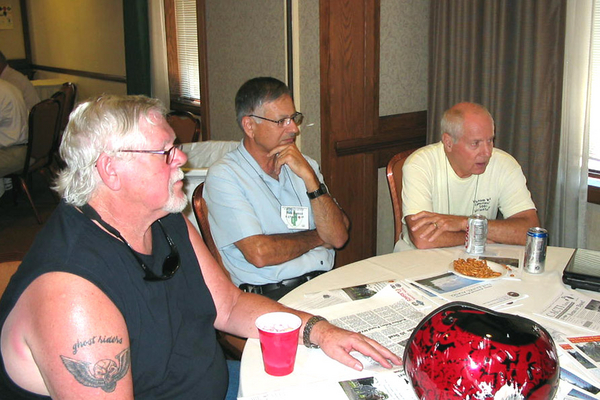 The Hospitality Suite
The Redlegs: Gary Dean Springer, Tom Roman, and Don  Keith represent the 2/9th Arty.
