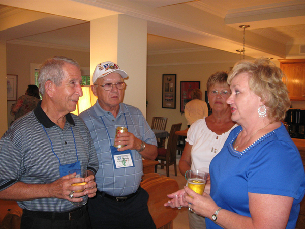 Telling war stories
Capt Dave Collins & Jerry Walling (C-1-35) listen intently as Diane Kammerer, wife of deceased 2/9th Arty FO Lt Tom Kammerer, tells her story.
