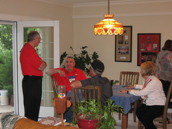 Chatting away
(at table) Greg Malnar with Linda & Dickie Dickerson.  Standing is Ed Moor, 2/9th FDC.
