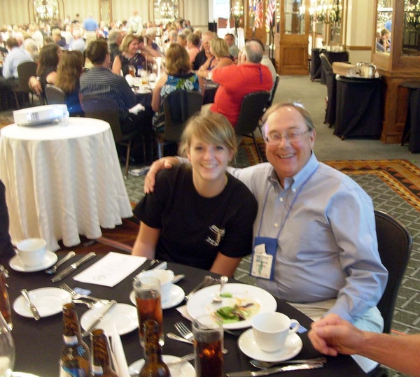 The Saturday Night Banquet
Banquet photos courtesy of Lt Bert Landau, FO, 2/9th Arty.
Lt Bert Landau smiles with the granddaughter of Sgt Lee Okerstrom.  Lee was in the FO Party with Bert.
