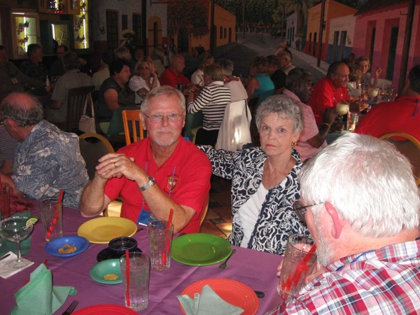 Party Time!  C-1-35 & 2/9th Arty at the LaMargarita
Lt FO Dennis Munden appears justly proud of amazing his audience with his story-telling.  Lovely spouse Alexis Munden seated at right and Lt Gary Dean Springer (with the "Santa Claus" hair) is seated at the table end.
