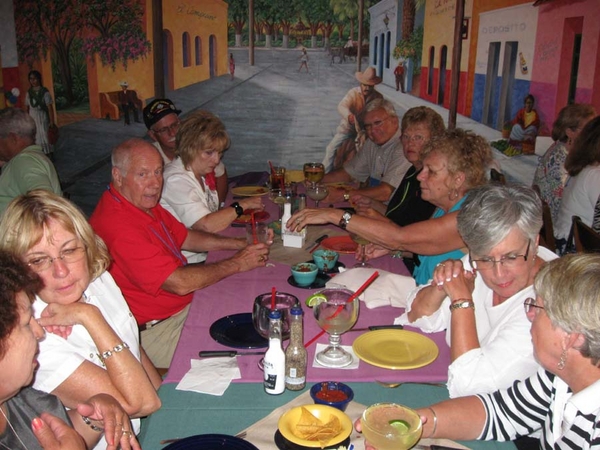 Party Time!  C-1-35 & 2/9th Arty at the LaMargarita
It may look like a picnic table in the middle of a street scene, but it's actually the men and gals of C-1-35 and 2/9th Arty enjoying a Friday night soiree.
