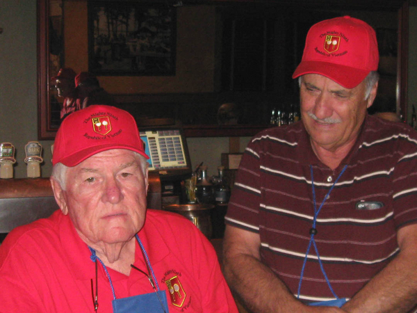 Reminiscing
Maj Jerry Orr has that distant look a lot of Vietnam veterans have while recalling the events of Nam with good friend Lt Mike Kurtgis.
