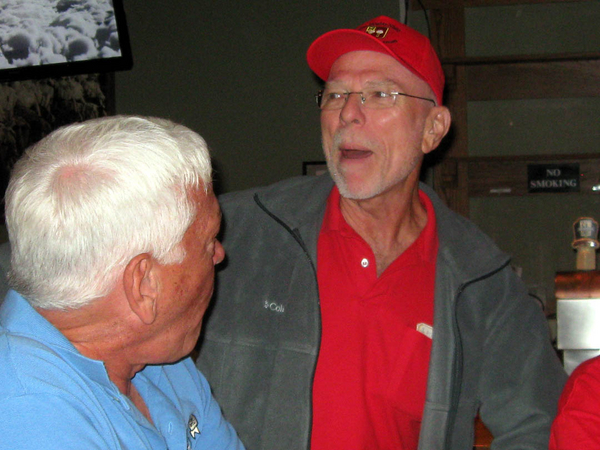 Old timers
Ed Thomas' white hair is certifying evidence that old FOs never die, their hair changes color.  John "Moon" Mullins has his head covered with a Mighty Ninth cap.
