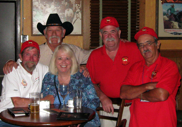 Getting the picture
Joe & Mrs Henderson, next to Jim Connolly and Dennis Dauphin, with Cowboy Danny Fort providing the backdrop at the Rock Bottom Grill.
