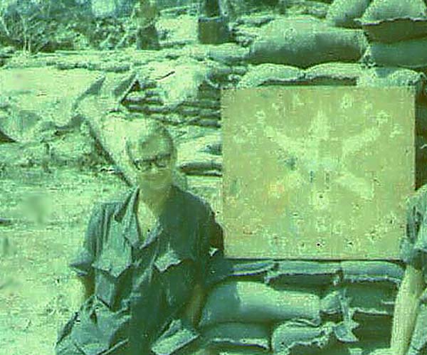 Outside the bunker at Hoi An
Lots of sandbags keep you safe.  The "Steve Allen" optical frames were standard military issue back then.  But...the helmets weren't!  Suckers wouldn't stay on my head.
