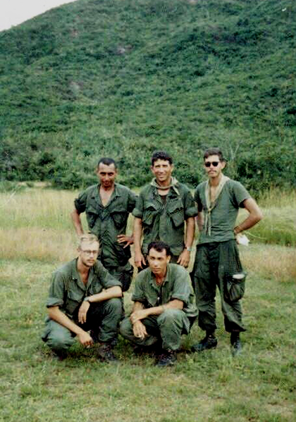 FO's Team
Kneeling, Front: Lt Bert Landau; Lt Tony Bloemhard (KIA) by friendly fire returning from a recon mission.
Back Row: Co 1SG Antonio Cartagena,  "C" Co commander, Capt Dave Collins, and Lt Joel Matusek, KIA.  The story of Lt Matusek is provided under Bert's "Tour of Duty" link.
