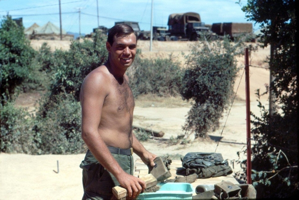 Happy Times
Sp4 Danny Yates cleaning up and squaring away his gear prior to going home.  Big smile, of course.
