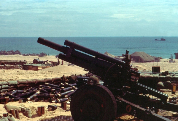 Ready for action
Probably one of the most scenic and nicest places ever to set up a 105mm howitzer battery...right on the beach of the South China Sea.
