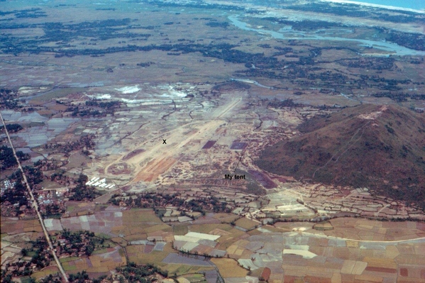 Hill at Duc Pho
This is the aerial picture from 1967, with an X marking the approximate spot where
the photo was taken, and the approximate location of my tent at the time.
That entire area from the X going north is a neighborhood now.
{A 2nd click of your mouse will enlarge the photo and provide a great view!}
