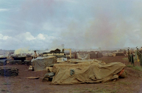 Under the "B":  Attack!!
About a million bees wanted to RSOP our battery position.  We popped some smoke to try and calm them.  Maj Tarr, the FAC pilot, thought we were under attack and was ready to call in some F-4s.  A great guy.
