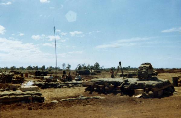 Lots of memories here...the sandbags, the M2 Aiming Circle, the R292 antenna reaching into the sky, the ammo crates, interlocking bunkers.
