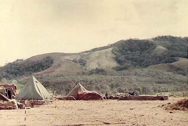 2/9th at Mang Yang Pass
Three howitzers of C/2/9 were moved to the Mang Yang Pass on Hwy 19.  Hills in the background were the source of incoming mortars.
