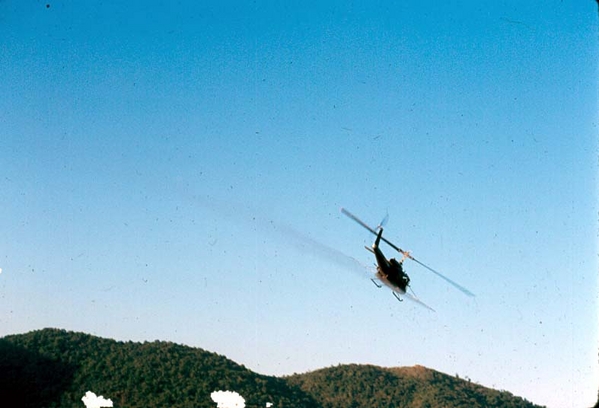 Firepower Demo
An armed helicopter giving a firepower demonstration.  Based on info from other Galleries, this firepower demo took place at LZ Uplift.
