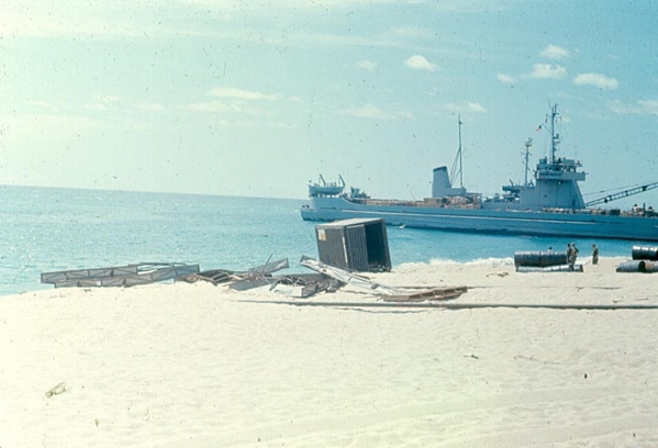 Navy Ship
A Navy supply ship unloads at the South China Sea.
Note the CONEX container in the center of the photo.  Two of these units welded together formed the highly mobile FDCs for the artillery units.
