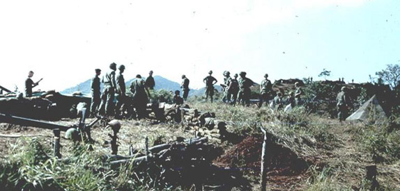 Captured VC
Troops gather around VC prisoner awaiting transport to interrogation.
