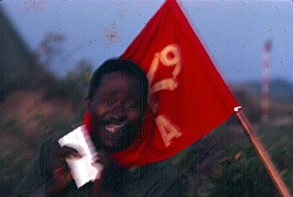 In The Flag
Radar Officer Emil Franklin is all smiles as he shows off a letter from home.
