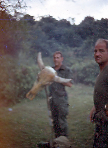 Capt Barton and 1Sgt Tewwis show off a water buffalo skull.
