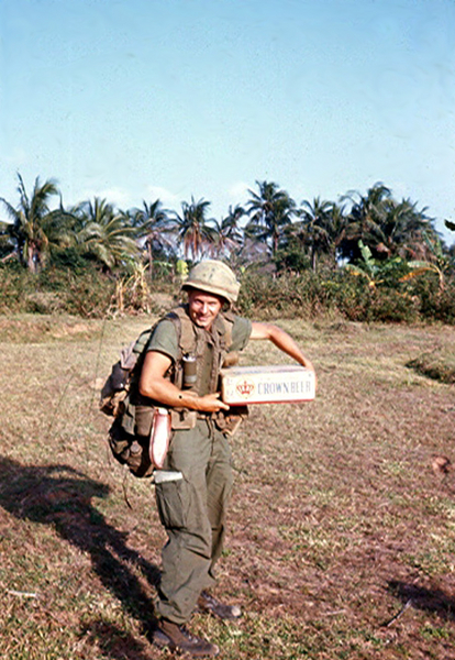 Lt Don Keith with an armload of pleasure...and a Bowie knife to open it.
