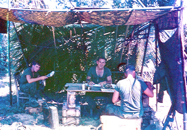 Capt Barton, Company Commander of B-1-35 works at his "field office".
