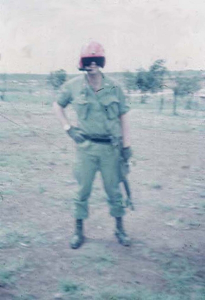 Lt Bob Bagwell seems to like the pilot's helmet.
