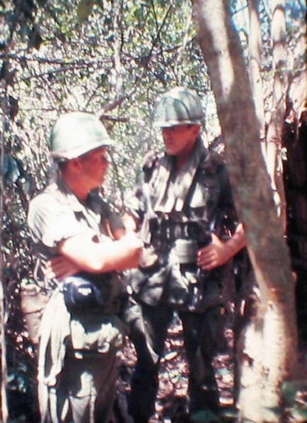 Capt Barton, B/1/35, checks with one of his troops.
