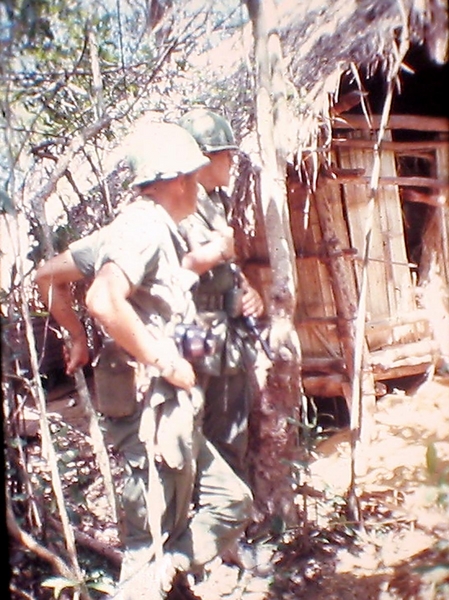 Men of B-1-35
They examine a local village on patrol.
