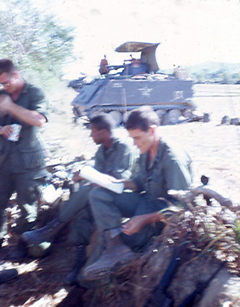 Men of B-1-35
Armored Personnel Carrier in background...complete with shelter.
