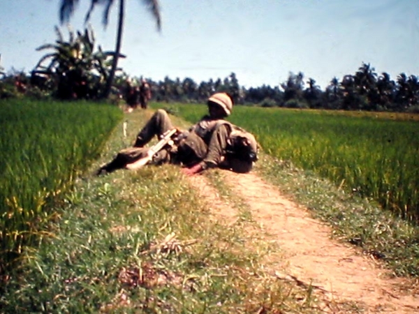 Riding the berm
An elevated walkway, called a "berm" allow farmers to work their rice paddies.  Many a firefight took place near a berm.
