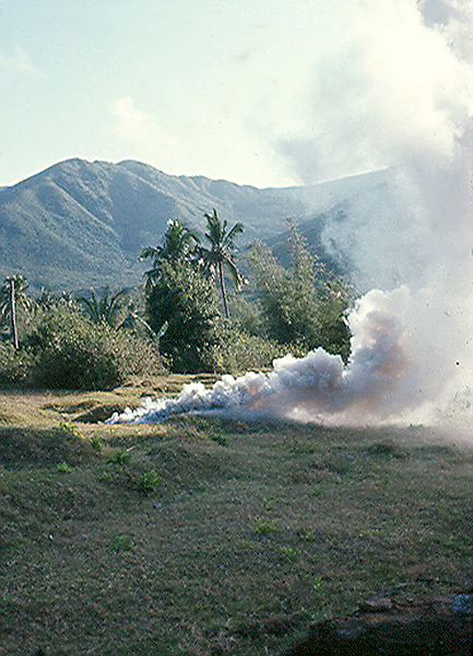 "Popping Smoke" was the SOP for letting a chopper pilot know where it is safe to land.  After he identifies the color, he is "good to go".
