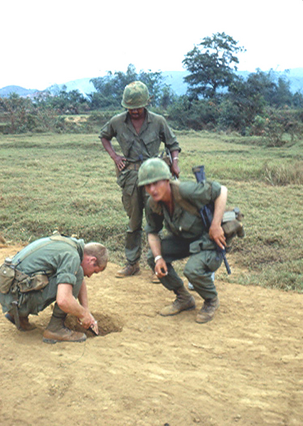 "I don't know about you, but I'm gettin' outta here!"
UNK digs out an enemy mine.
