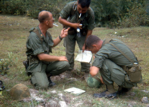 Where are we?  A map exercise.
"Matches?  I thought you had the matches!"
Maj Gerrold Tippen (S-3, 1/35)), CPT Lloyd Yoshina (A/1/35), Maj Moore (BnCo, 1/35).

