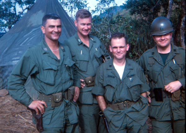 Bn Staff Visit
"Didn't you hear? We got a six-month drop!"

Maj Vincente DeJesus, Bn Asst S-3, Capt Keith Carlton, "A" Btry CO, Capt Doug Johnson, Bde LNO, Capt Hutsell, Bn S-4
