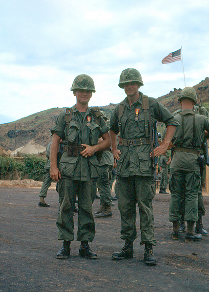 Vietnamese Awards Ceremony
Maj Doug Johnson and Lt Don Keith display Vietnamese medals.
