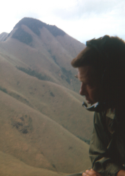 Looking out the helo door is 35th Inf Battalion Commander Maj Moore.
