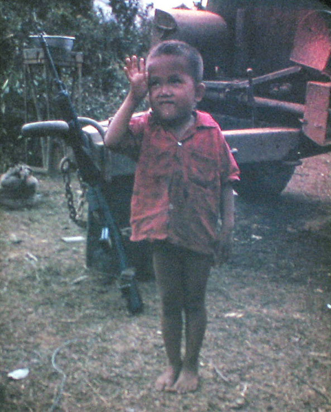 The Innocents of warfare
Tu Lin, a beautiful Vietnamese boy, was orphaned when his parents were killed in an attack.  Tu Lin was "adopted" for 30 days by the men of the battery before being presented to an orphanage.  Here, Tu Lin salutes his "Army Buddies".
