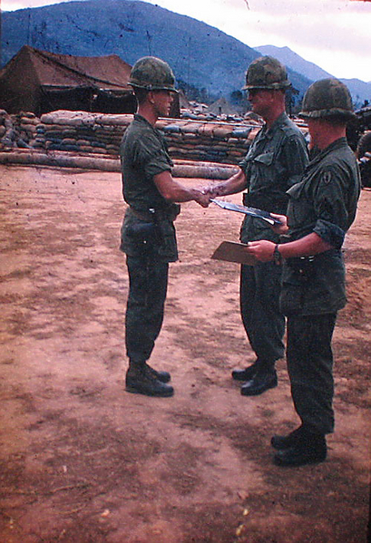 Bronze Star Award
Lt Ed Thomas gets a congratulatory handshake from LtCol Bruce Holbrook, Battalion Commander
